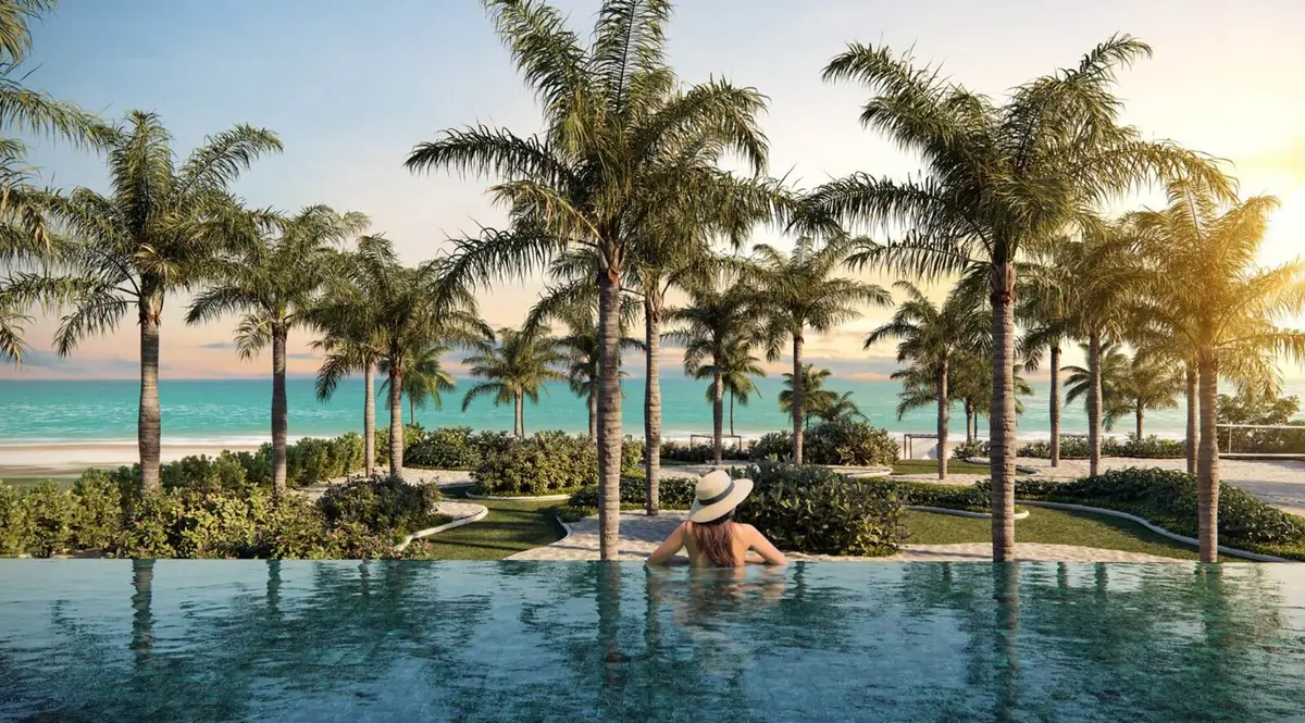Piscina de borda infinita pé na areia do Kaá Residencial